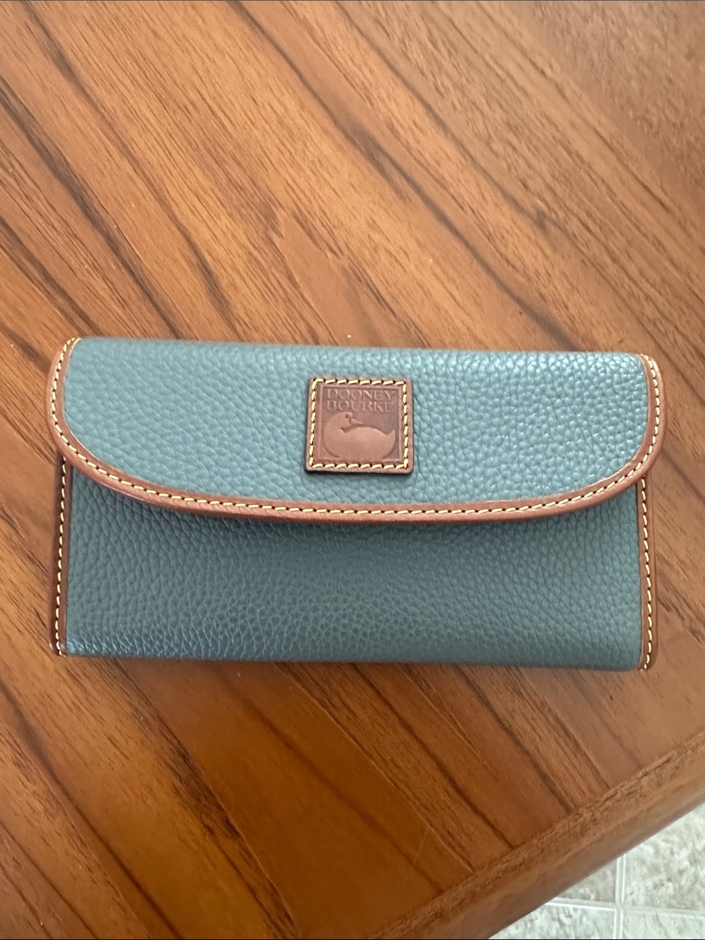 Dooney & Bourke Teal Pebble Leather Wallet with Brown Trim